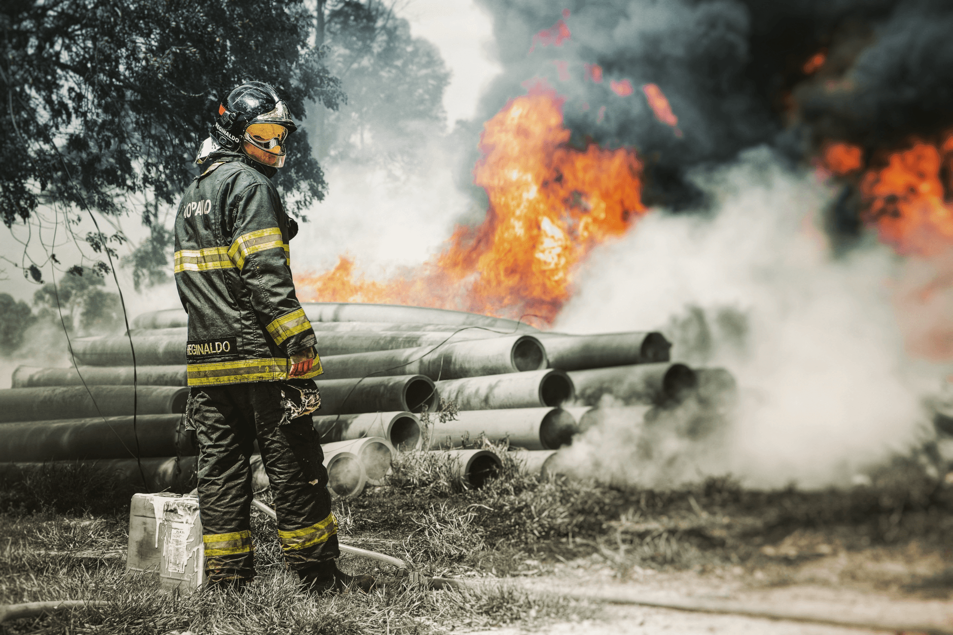 Firefighters working from an aerial ladder